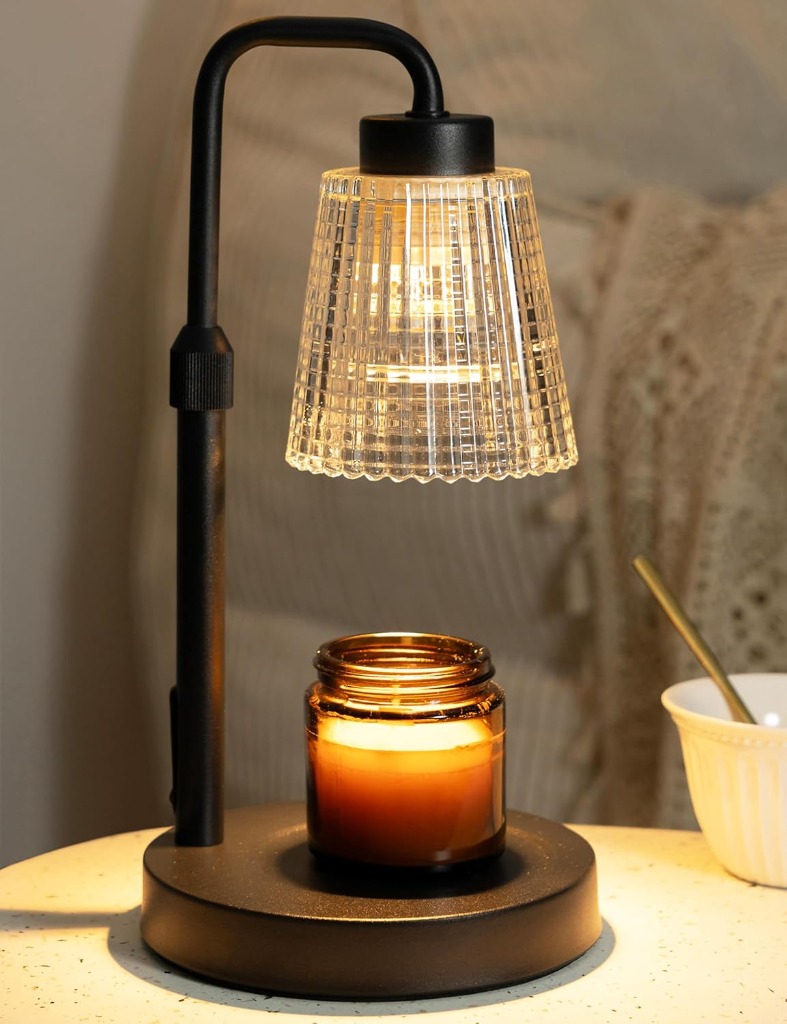 GODONLIF Adjustable Candle Warmer Lamp with crystal glass shade glowing warm gold over an amber candle jar — official Amazon product photo