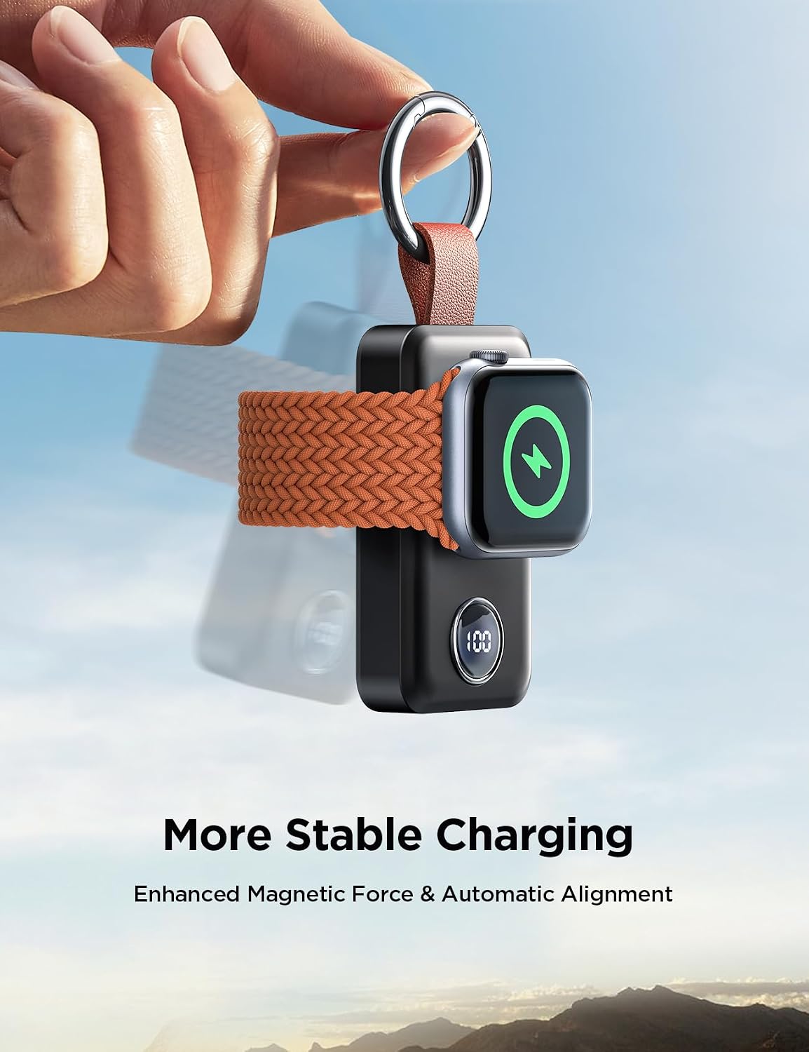 JOYROOM Portable Apple Watch Charger held by carabiner keyring demonstrating stable magnetic hold with braided watch band wrapped around body